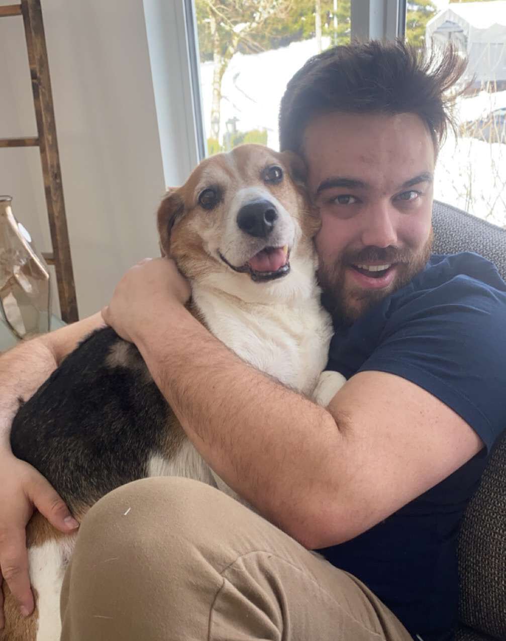 A picture of a boy and his dog